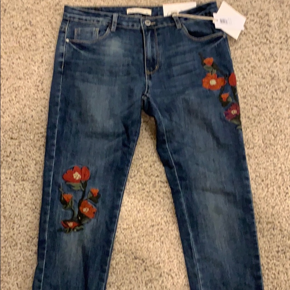 Q2 unique Denim stretchy pants with floral decal